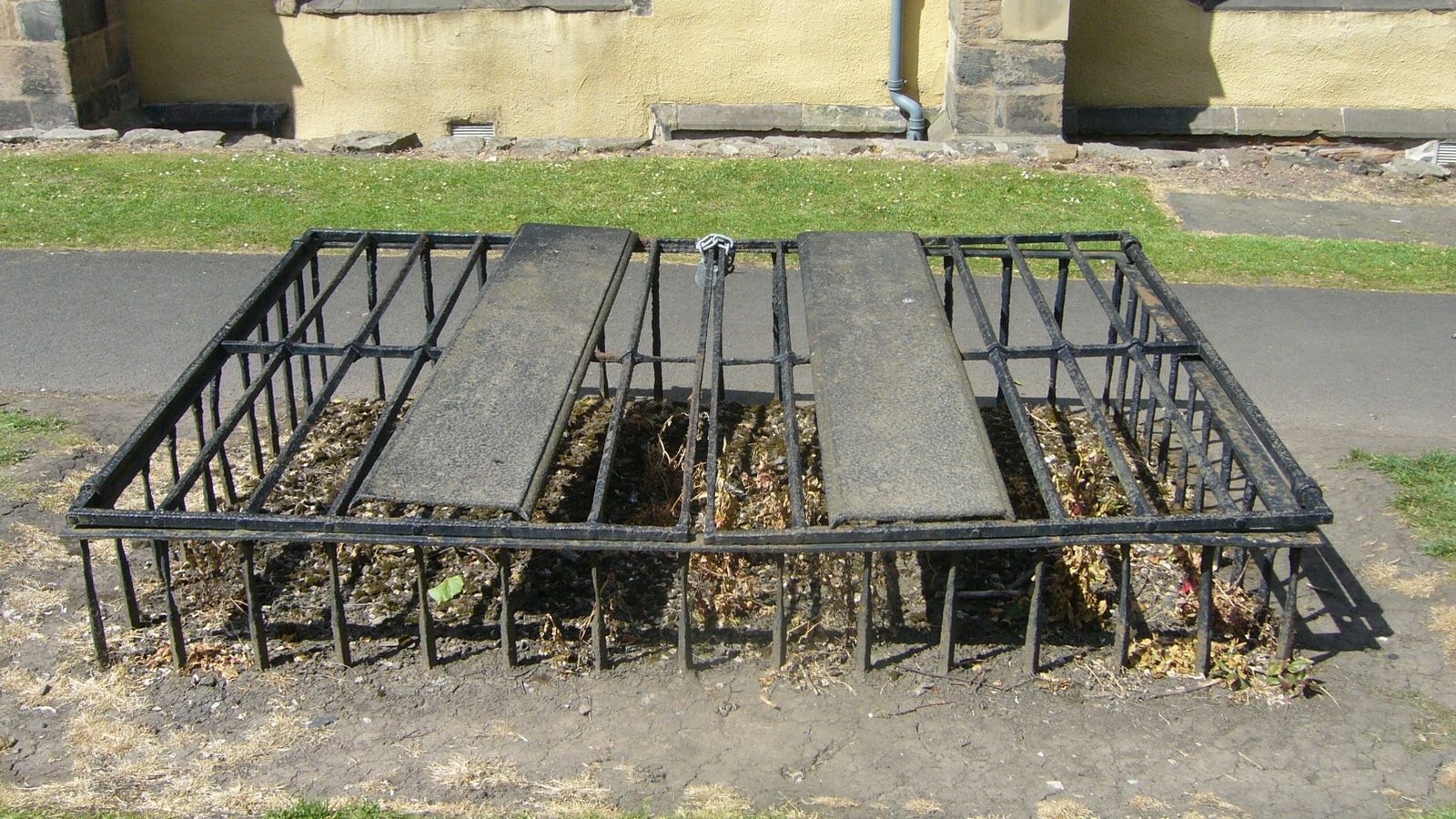 Iron mortsafe over a grave in Greyfriars Kirkyard, Edinburgh